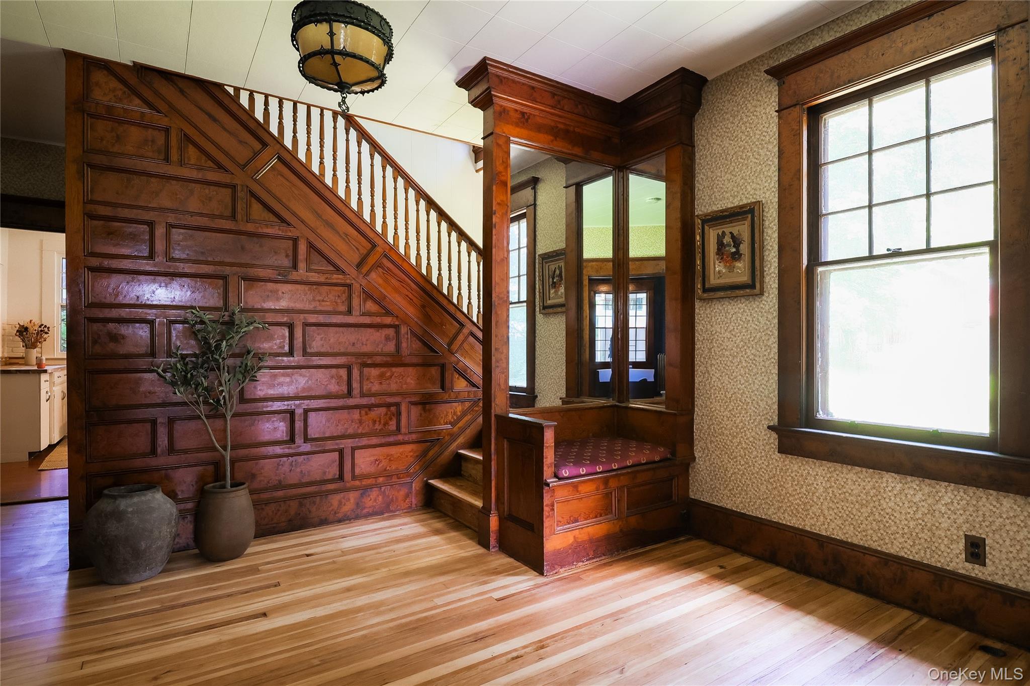 12 Highview Avenue Callicoon, NY 12723 - Photo 4 of 39 a view of an empty room with wooden floor and windows