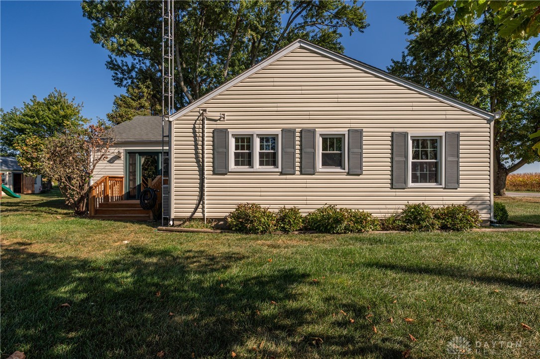 1599 Garringer Road Jamestown, OH 45335 - Photo 37 of 73 This charming home offers comfort and convenience with a classic exterior and inviting outdoor space.