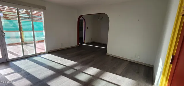 a view of an empty room and window