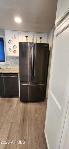 a utility room with washer and dryer