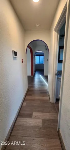 a room with window and wooden floor