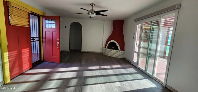 a view of a hallway with a washer and dryer