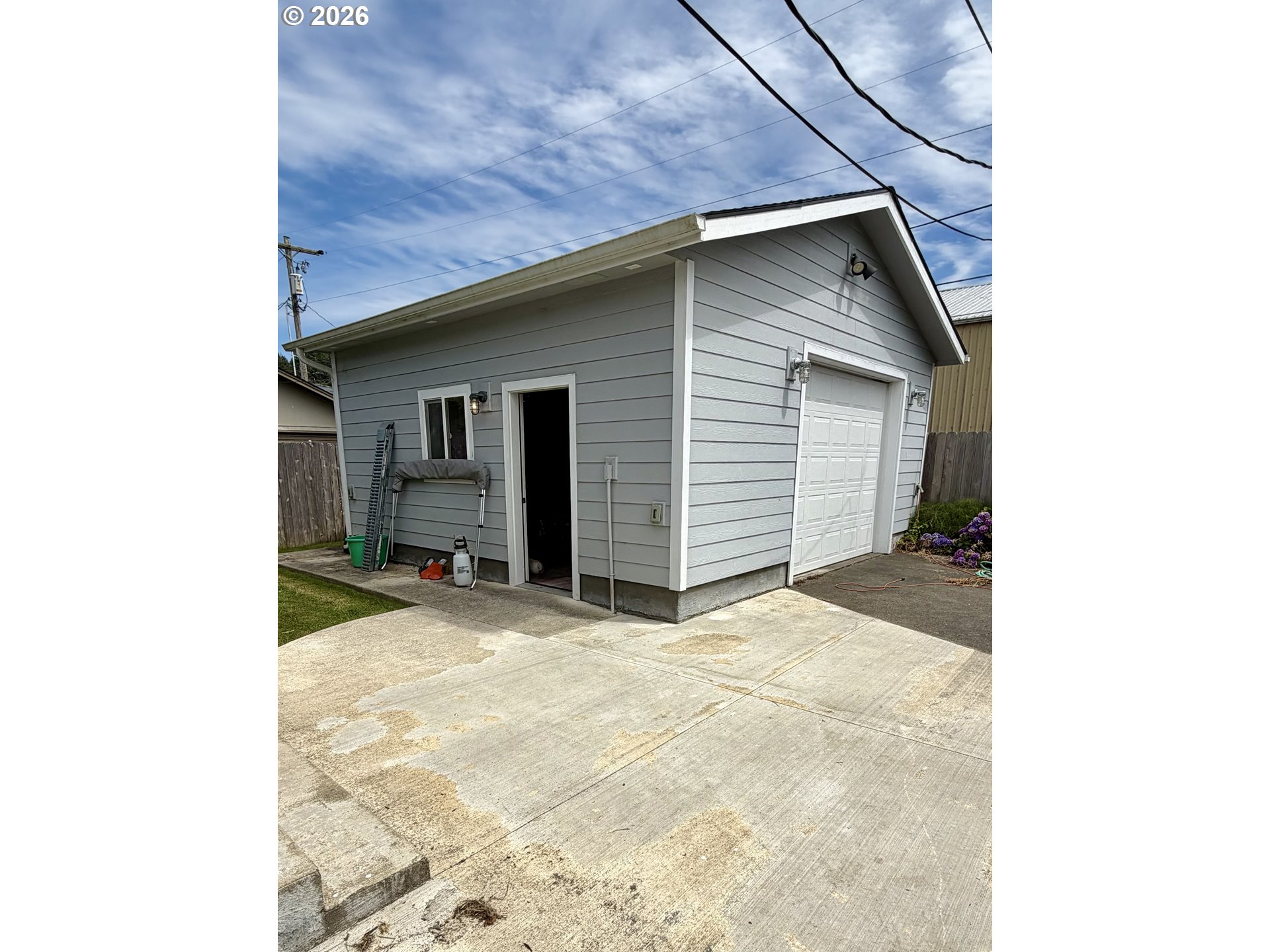 974 Fir Avenue Reedsport, OR 97467 - Photo 22 of 25 a view of a house with a garage