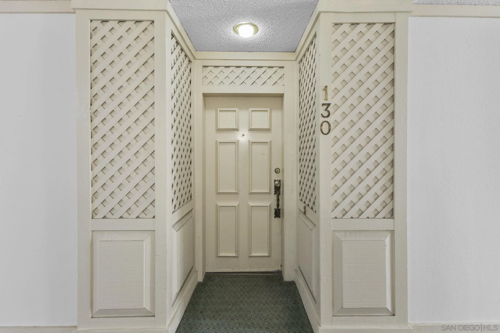 6747 Friars Road, Unit 130 San Diego, CA 92108 - Photo 27 of 32 a view of a hallway with closet