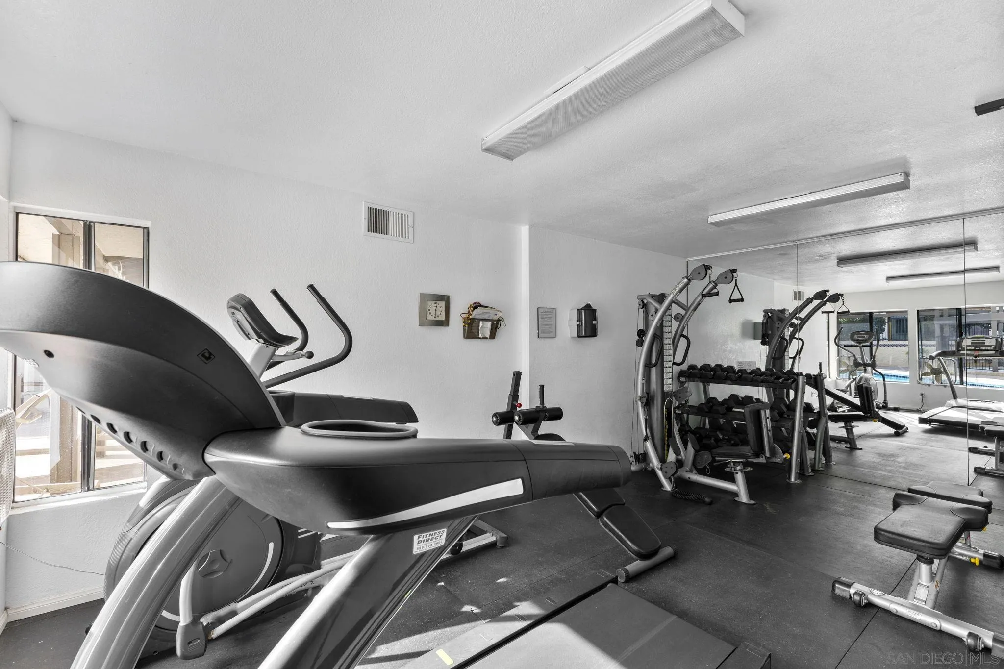6747 Friars Road, Unit 130 San Diego, CA 92108 - Photo 30 of 32 a view of a room with gym equipment