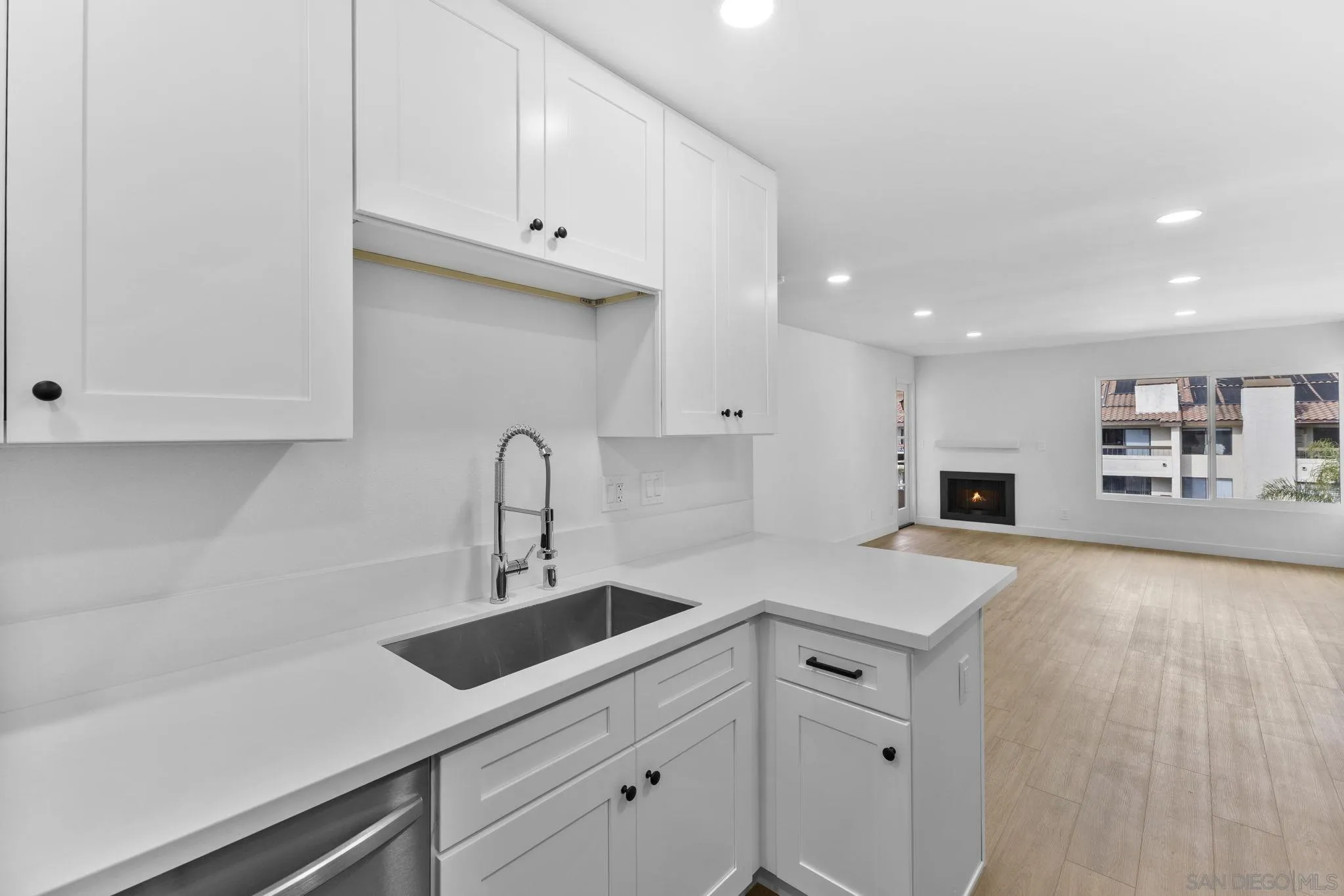 6747 Friars Road, Unit 130 San Diego, CA 92108 - Photo 4 of 32 a view of a kitchen with cabinets