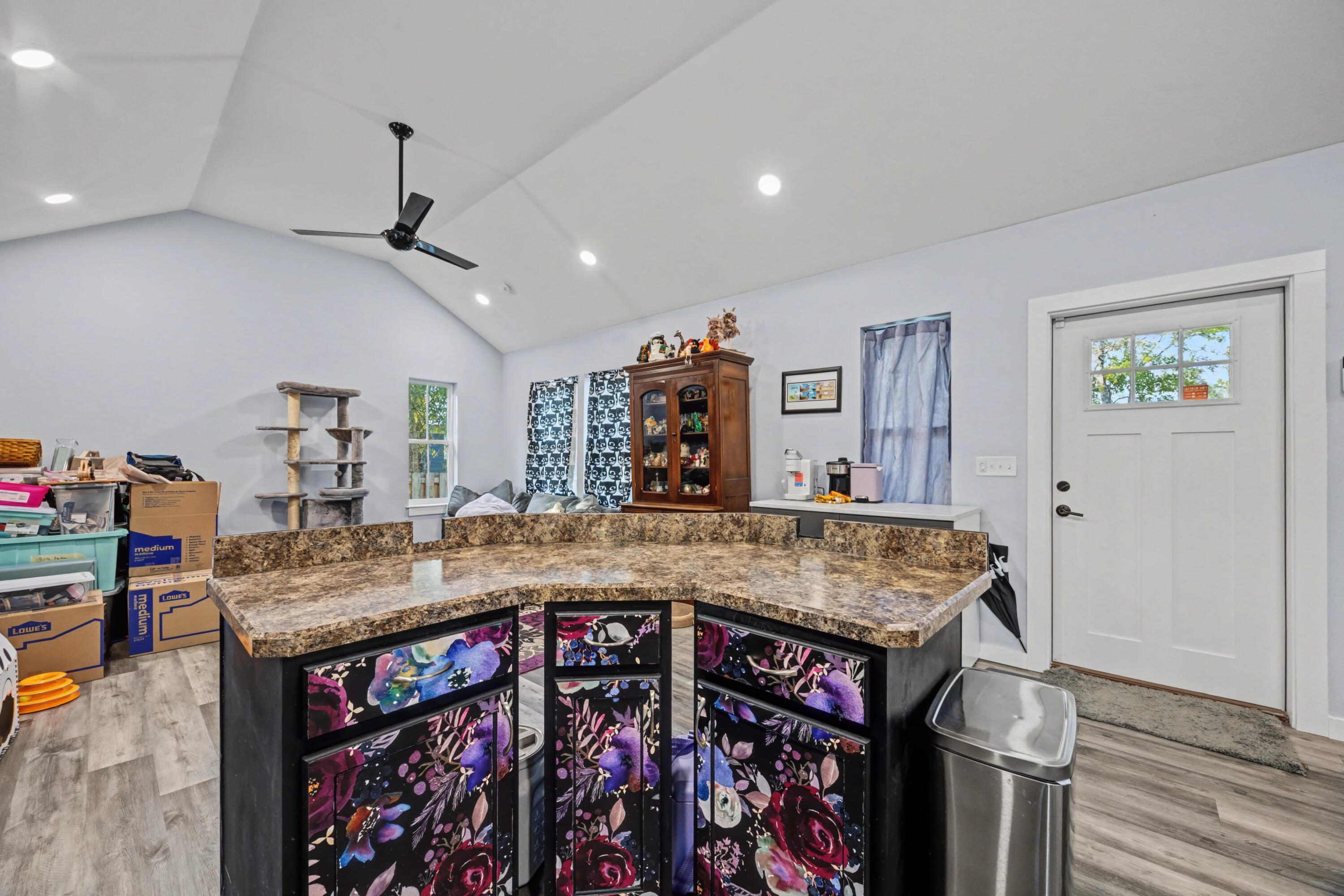 255 West Renoir Road DeFuniak Springs, FL 32433 - Photo 11 of 30 a kitchen with stainless steel appliances granite countertop a sink stove and refrigerator