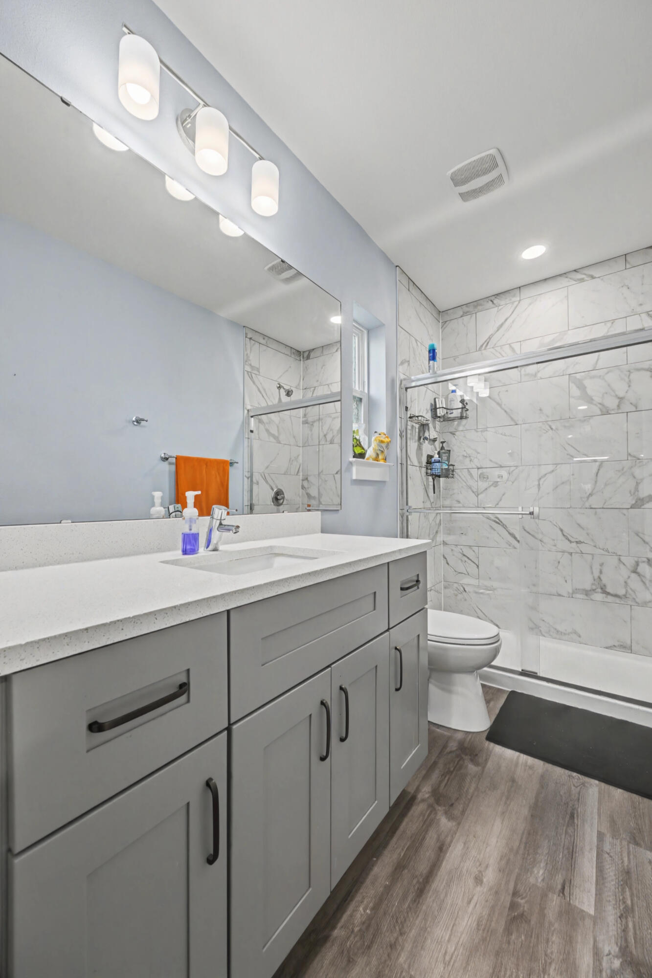 255 West Renoir Road DeFuniak Springs, FL 32433 - Photo 14 of 30 a bathroom with a sink a toilet and shower