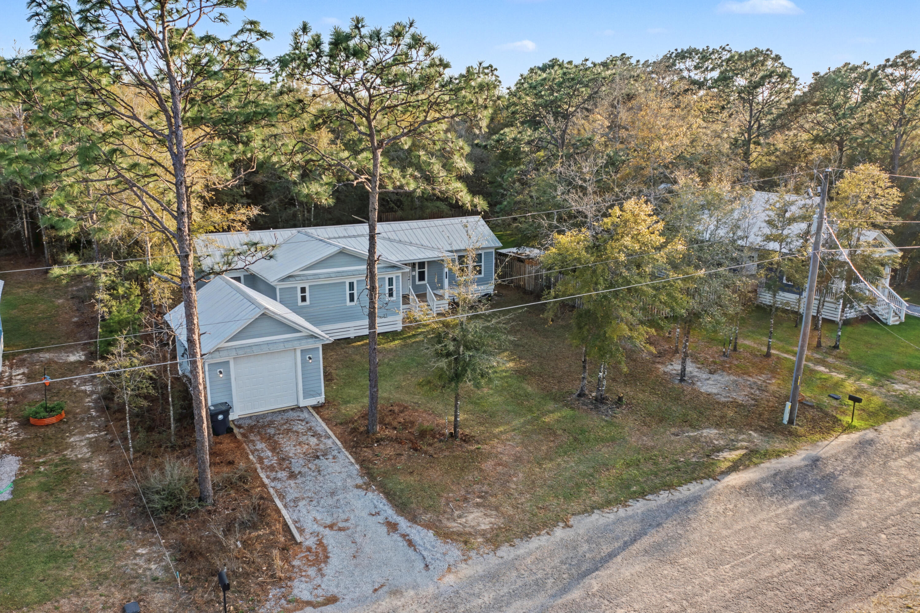 255 West Renoir Road DeFuniak Springs, FL 32433 - Photo 26 of 30 front view of a house with a yard