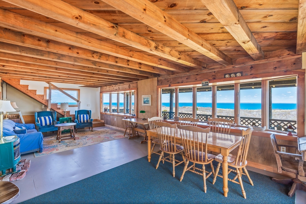 0 Bayberry Hill Road Cuttyhunk, MA 02713 - Photo 6 of 12 a view of a swimming pool with outdoor seating