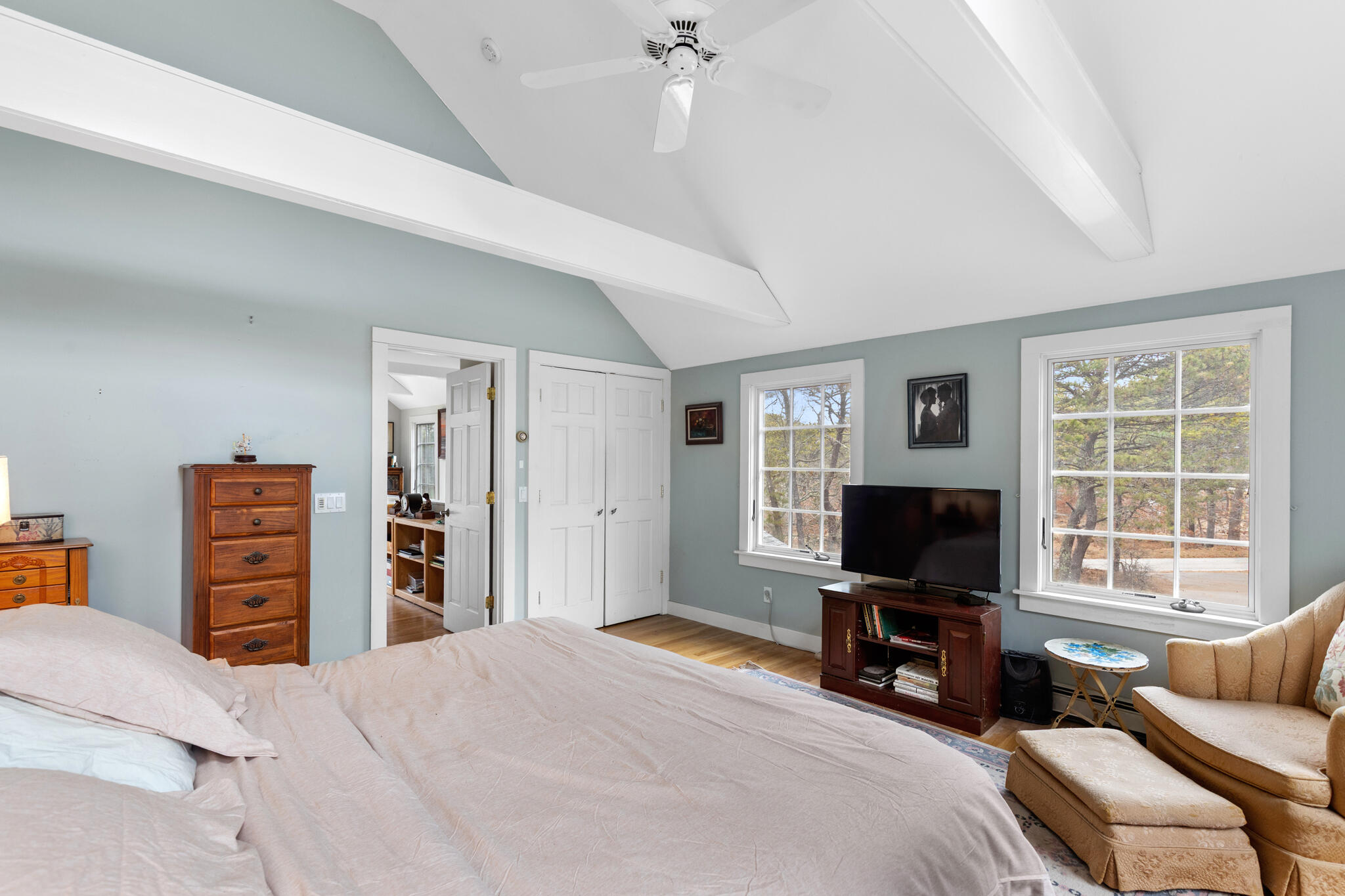 311 South Sunken Meadow Road Eastham, MA 02642 - Photo 41 of 57 a bedroom with furniture and a flat screen tv