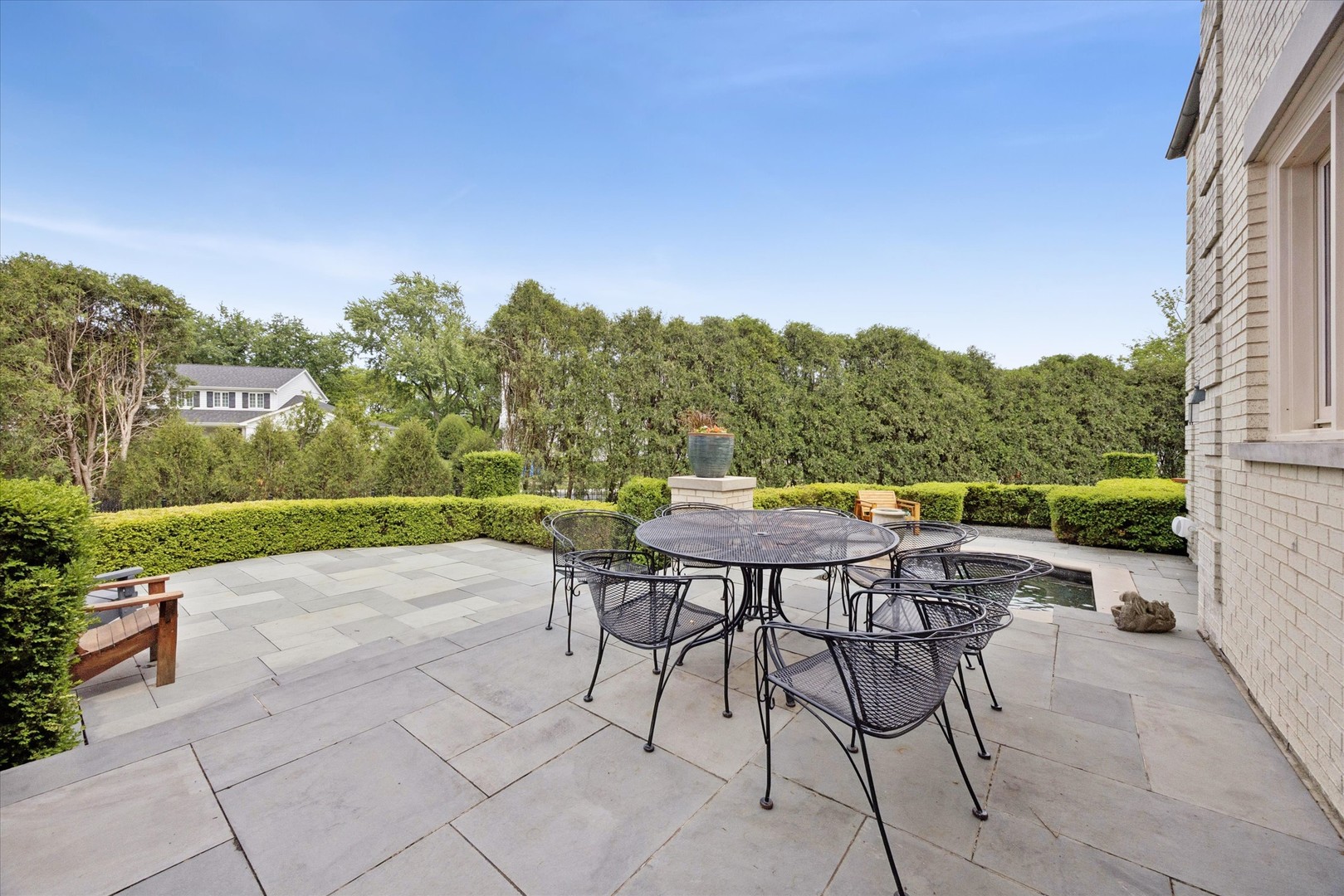 325 Princeton Road Hinsdale, IL 60521 - Photo 46 of 55 a view of a chairs and table on the terrace