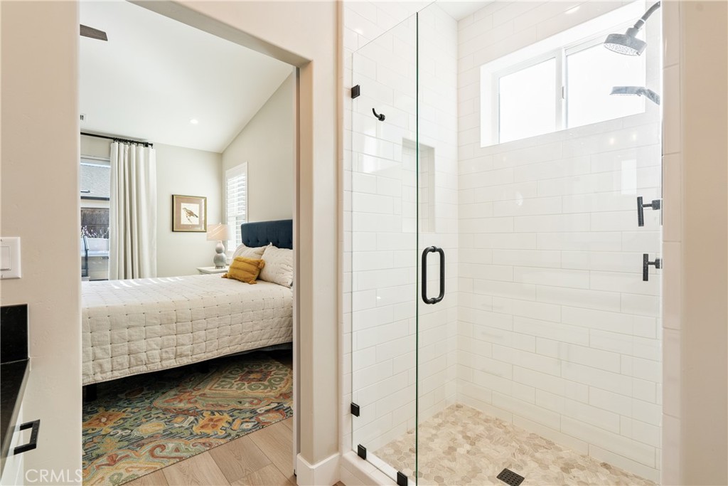 8550 El Corte Road Atascadero, CA 93422 - Photo 29 of 72 a bedroom with a bed and a window