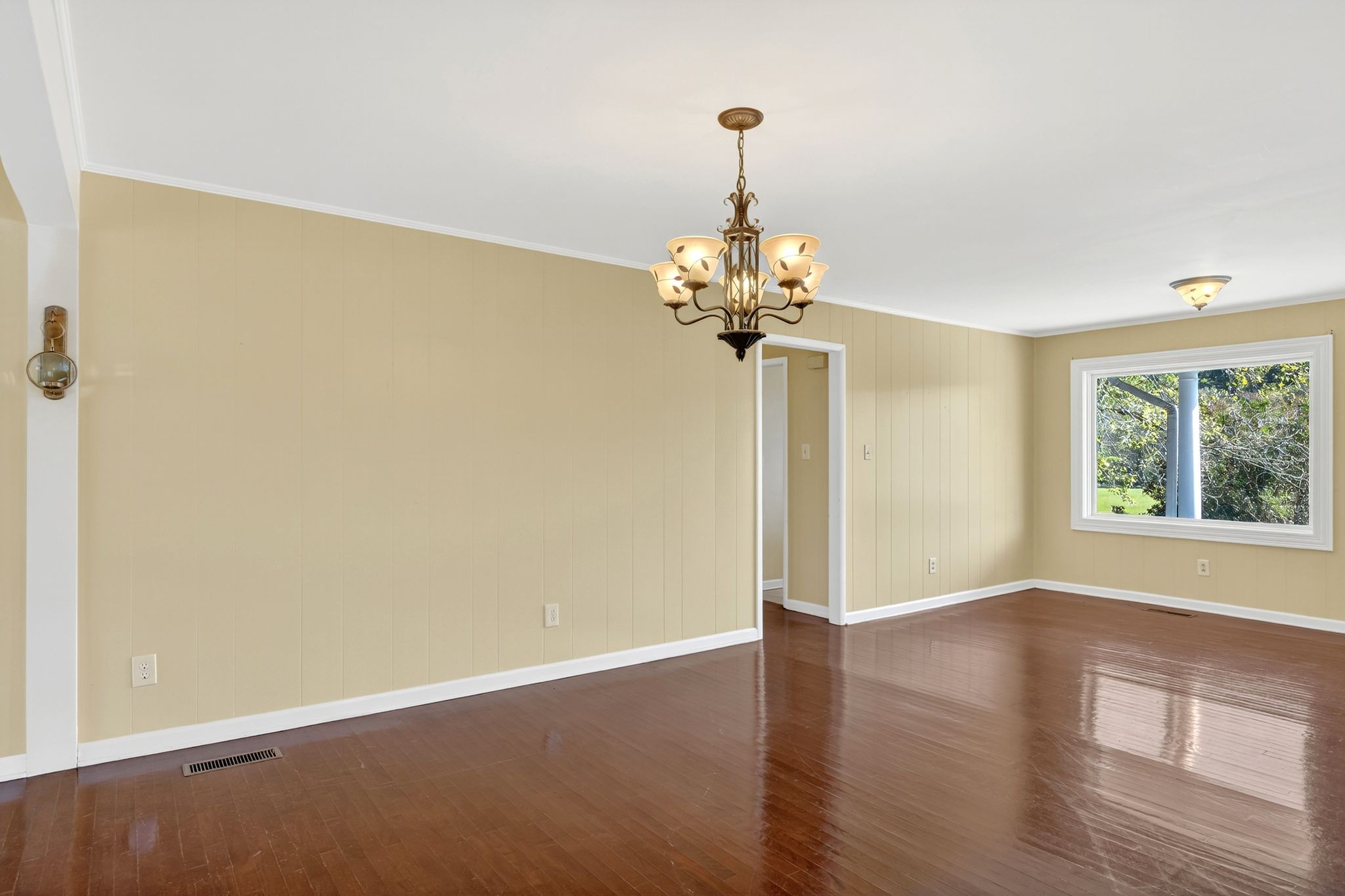 303 Poorhouse Road Taft, TN 38488 - Photo 8 of 96 a view of a room with a window and wooden floor