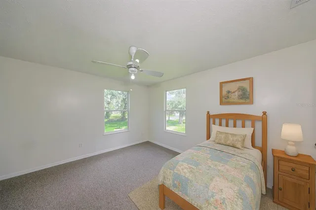 a view of a house with a big yard