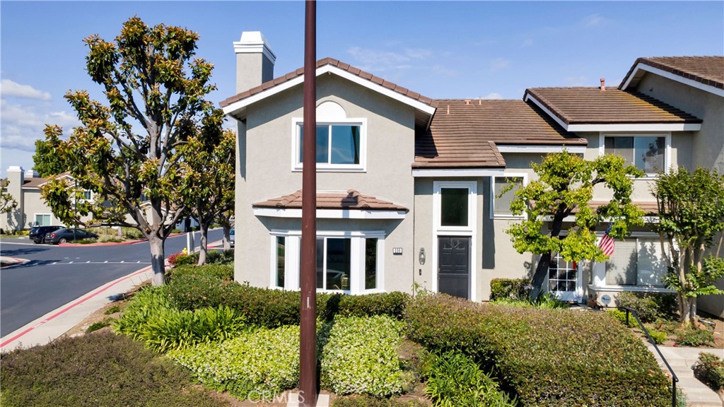 336 Fallingstar Irvine, CA 92614 - Photo 2 of 73 front view of a house with a yard
