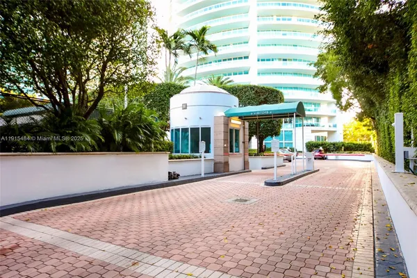 a view of a building with sitting area