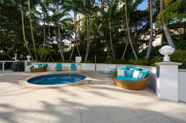 a view of a swimming pool with a lounge chairs