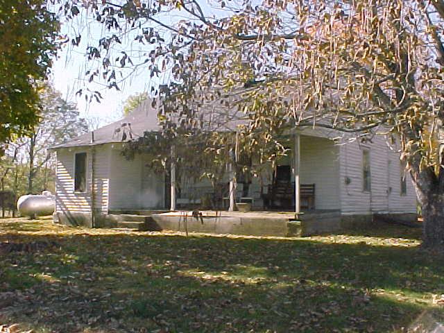 ALTERNATE VIEW OF HISTORIC FARMHOUSE ON PROPERTY.