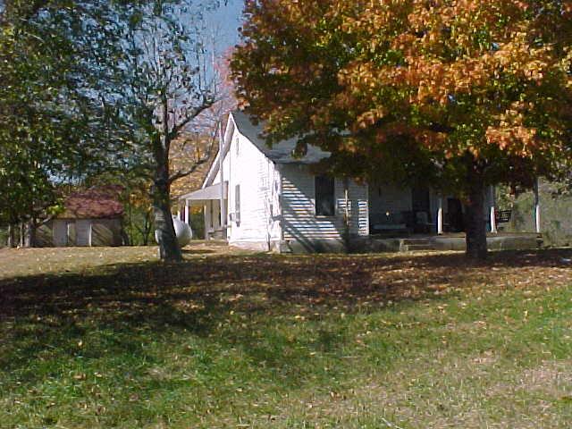 ALTERNATE VIEW OF HISTORIC FARMHOUSE.