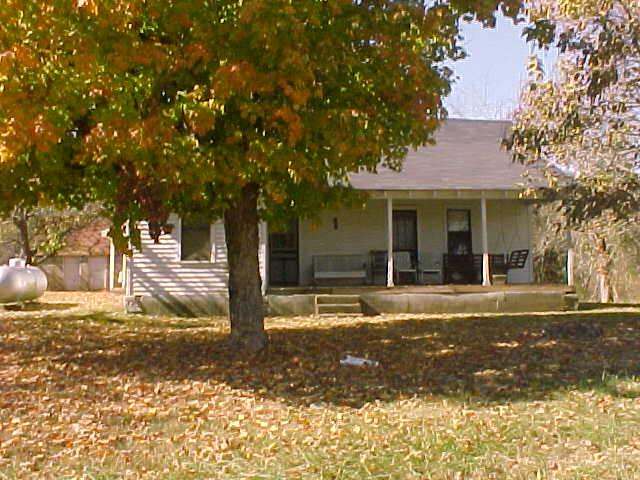 ALTERNATE VIEW OF HISTORIC FARMHOUSE.