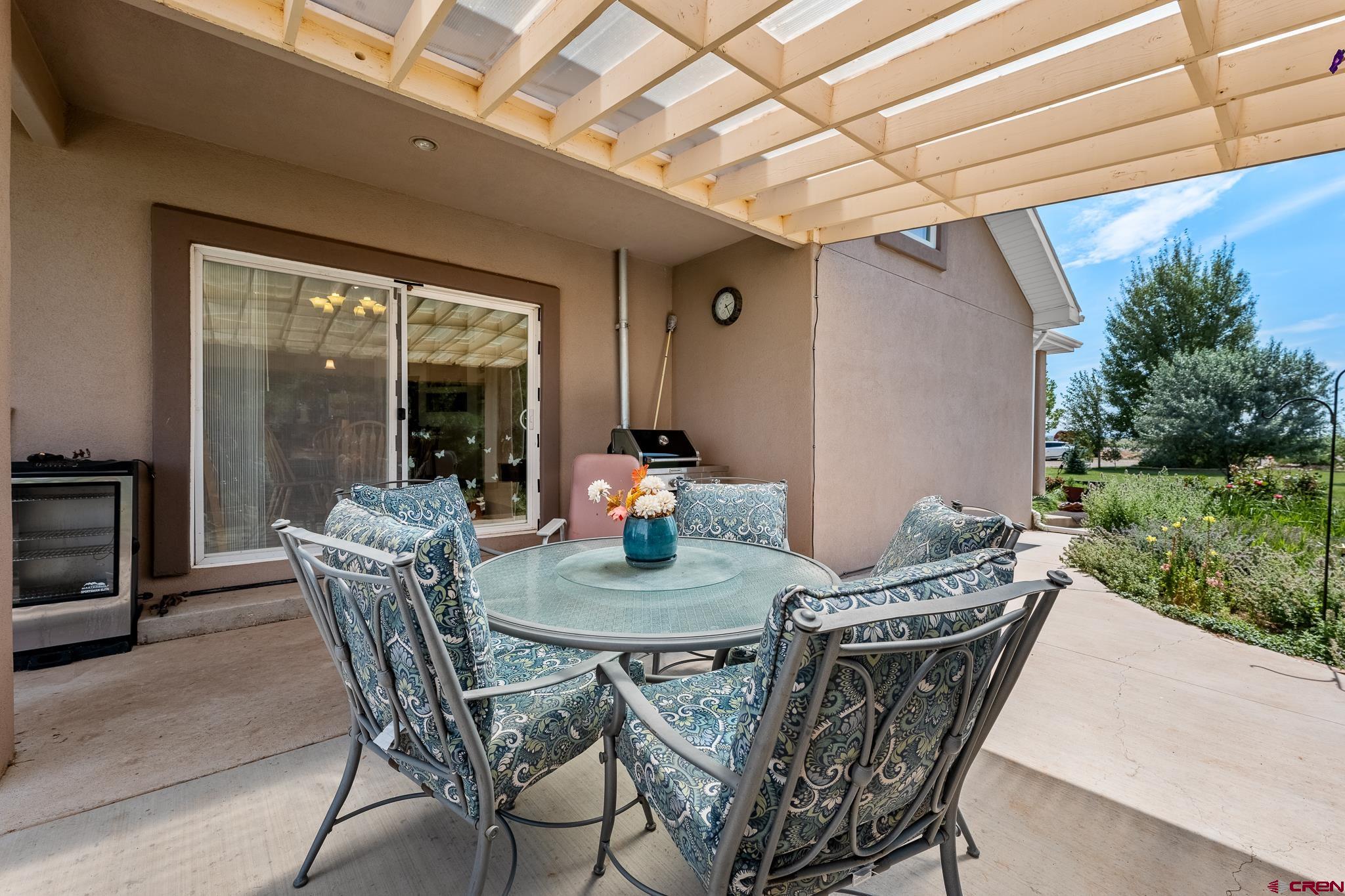 13723 Rd T Cahone, CO 81320 - Photo 23 of 36 a dining room with furniture and garden view