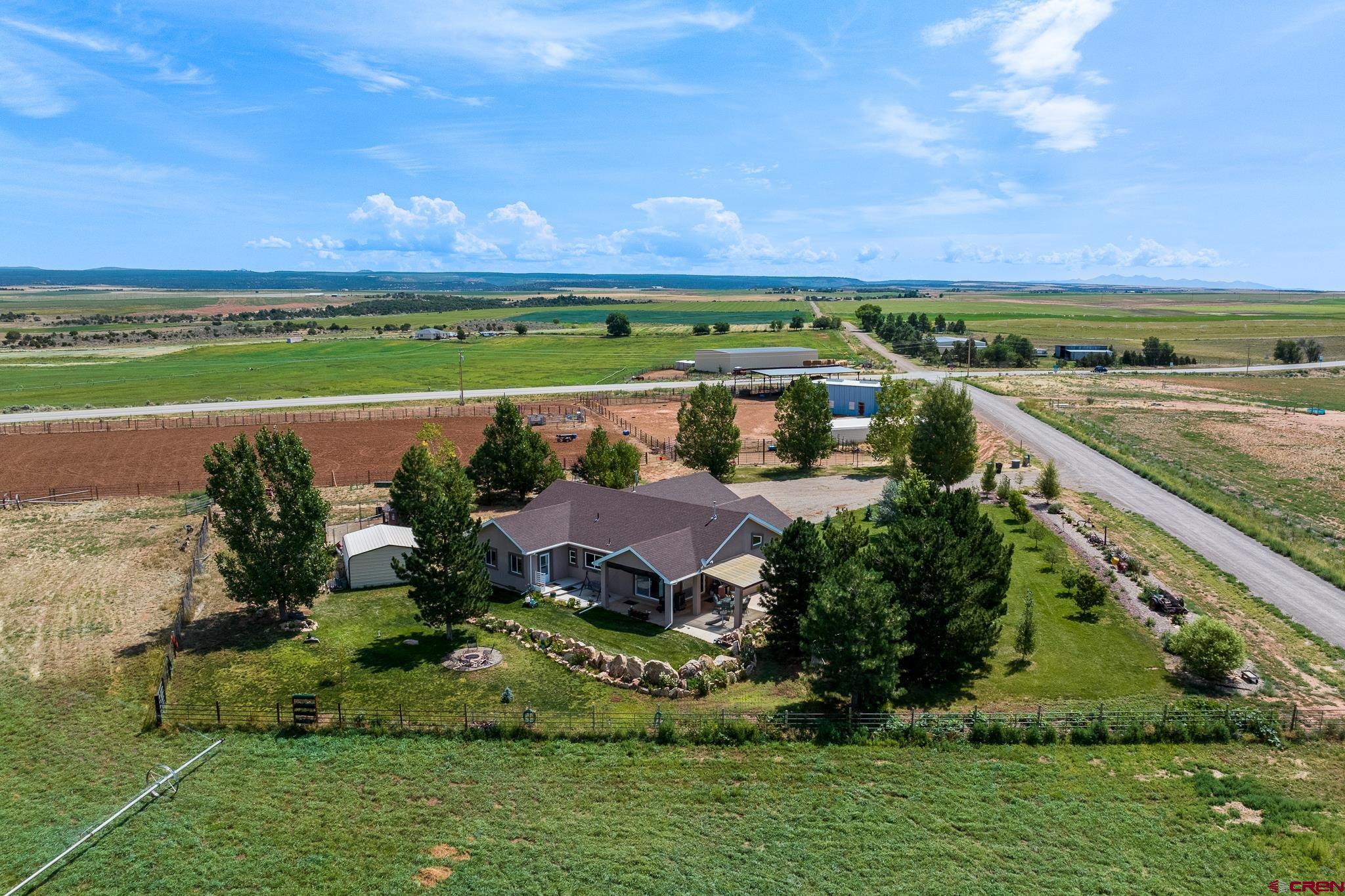 13723 Rd T Cahone, CO 81320 - Photo 29 of 36 an aerial view of a house with a garden