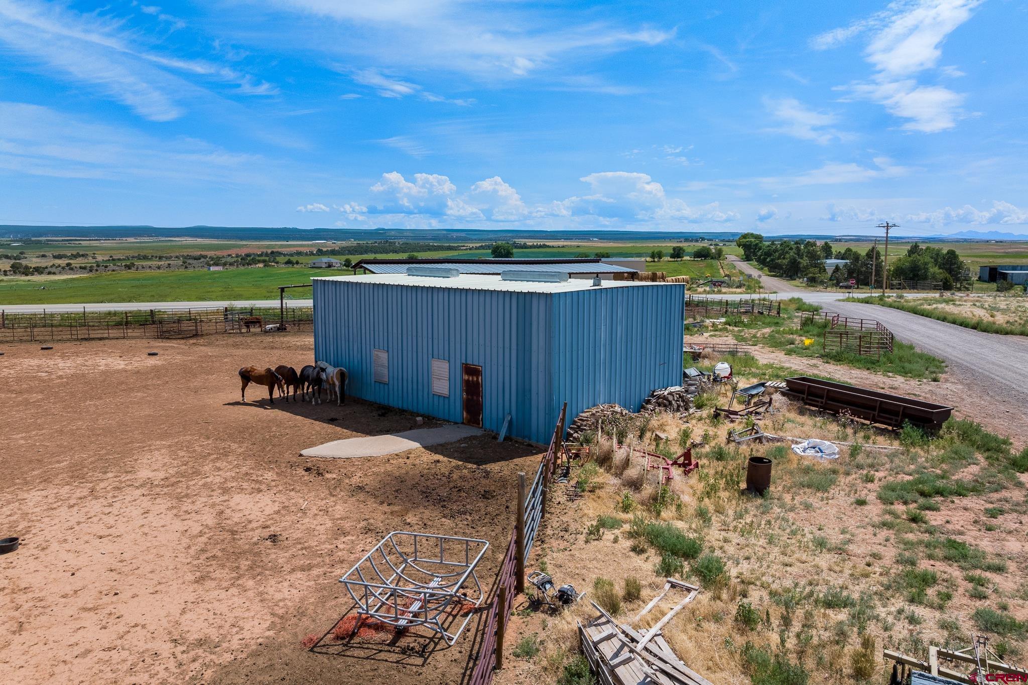 13723 Rd T Cahone, CO 81320 - Photo 30 of 36 a view of a backyard with a table and chairs
