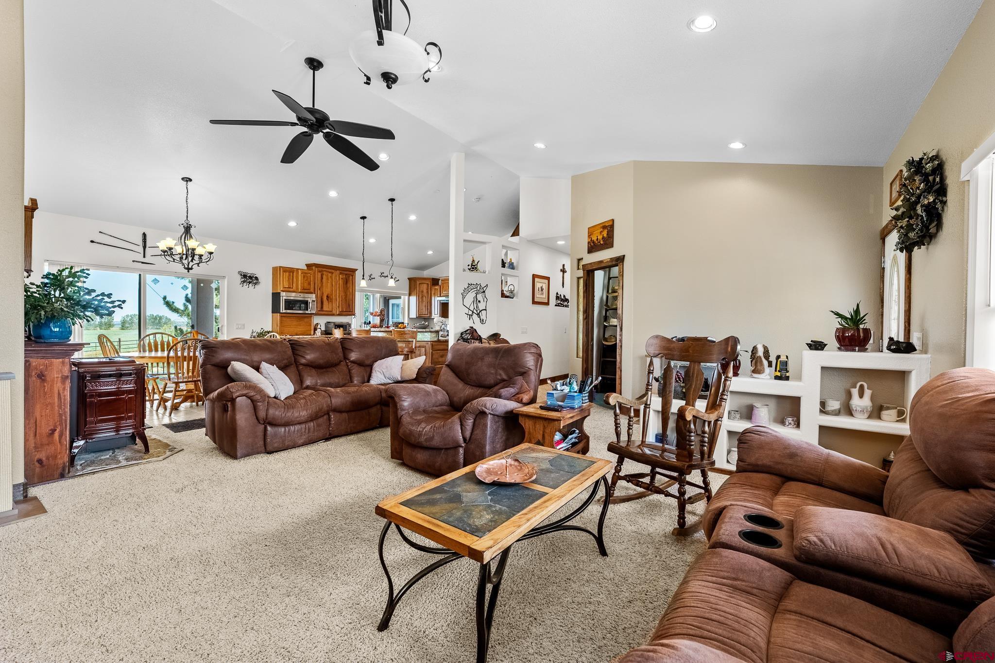 13723 Rd T Cahone, CO 81320 - Photo 4 of 36 a living room with furniture kitchen view and a wooden floor