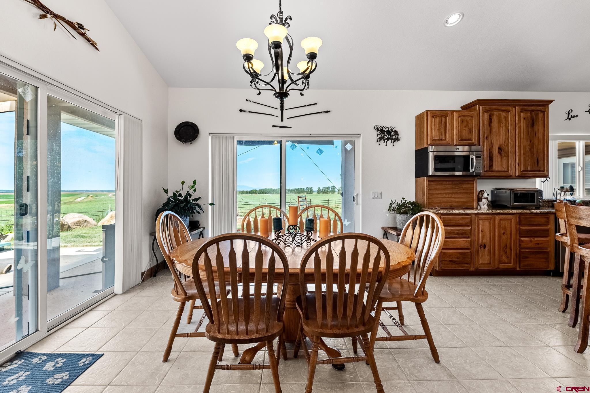 13723 Rd T Cahone, CO 81320 - Photo 5 of 36 a view of a dining room with furniture window and outside view