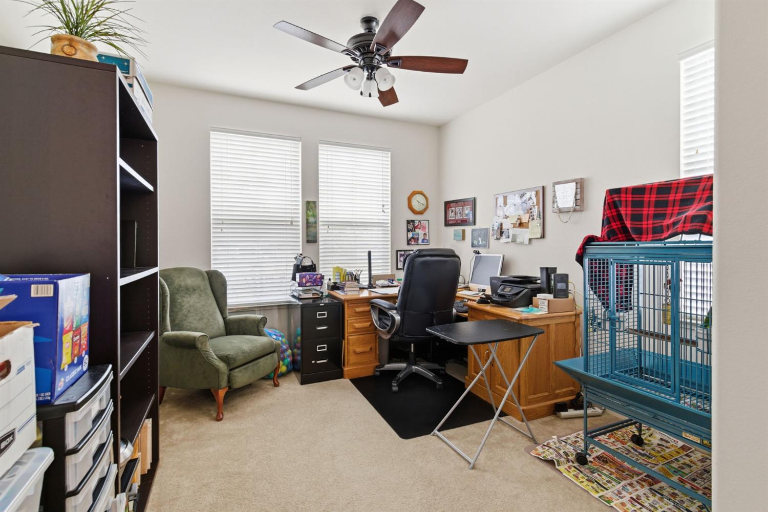 1806 West Ripon Road Ripon, CA 95366 - Photo 12 of 65 a view of a workspace with furniture and a window