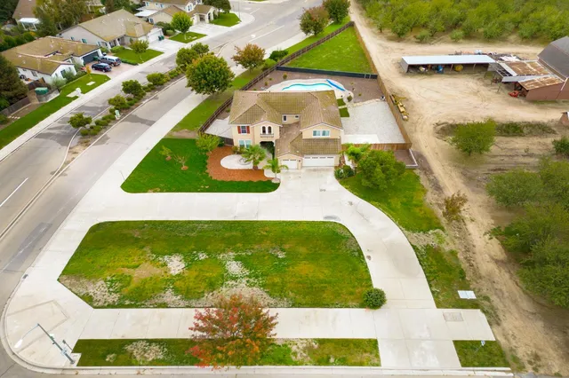 a view of swimming pool with a garden