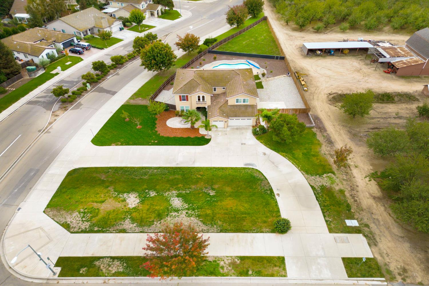 1806 West Ripon Road Ripon, CA 95366 - Photo 2 of 65 a view of swimming pool with a garden