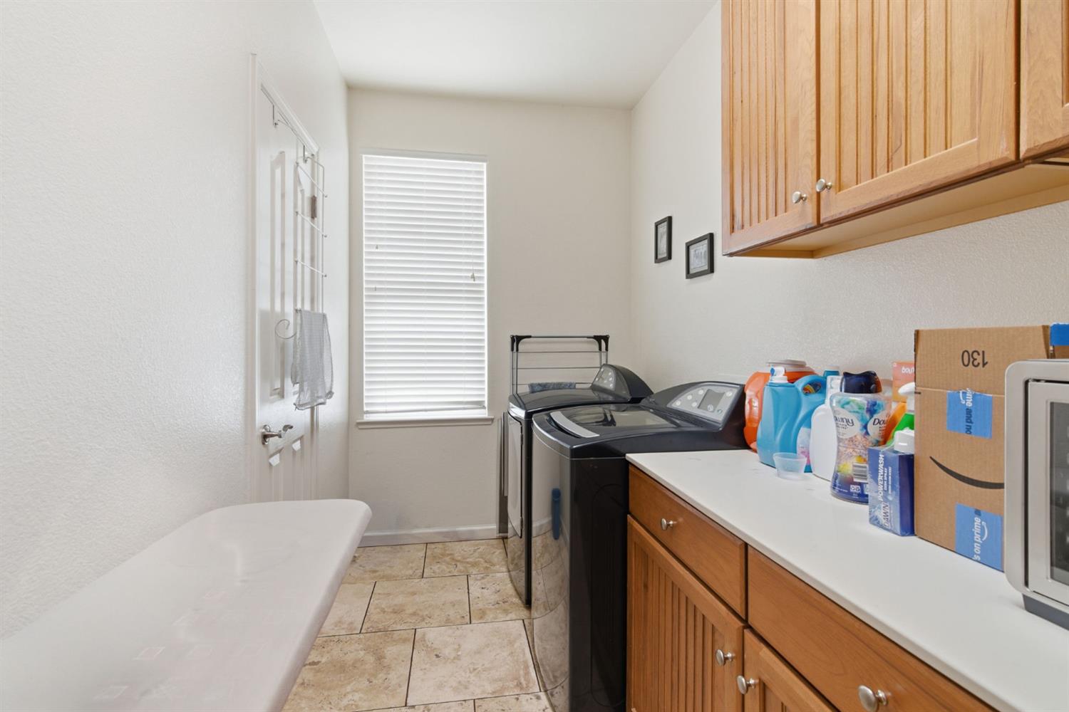 1806 West Ripon Road Ripon, CA 95366 - Photo 28 of 65 a view of a kitchen with a sink and dishwasher