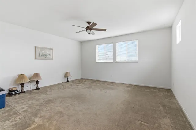 a bathroom with a sink double vanity and a mirror