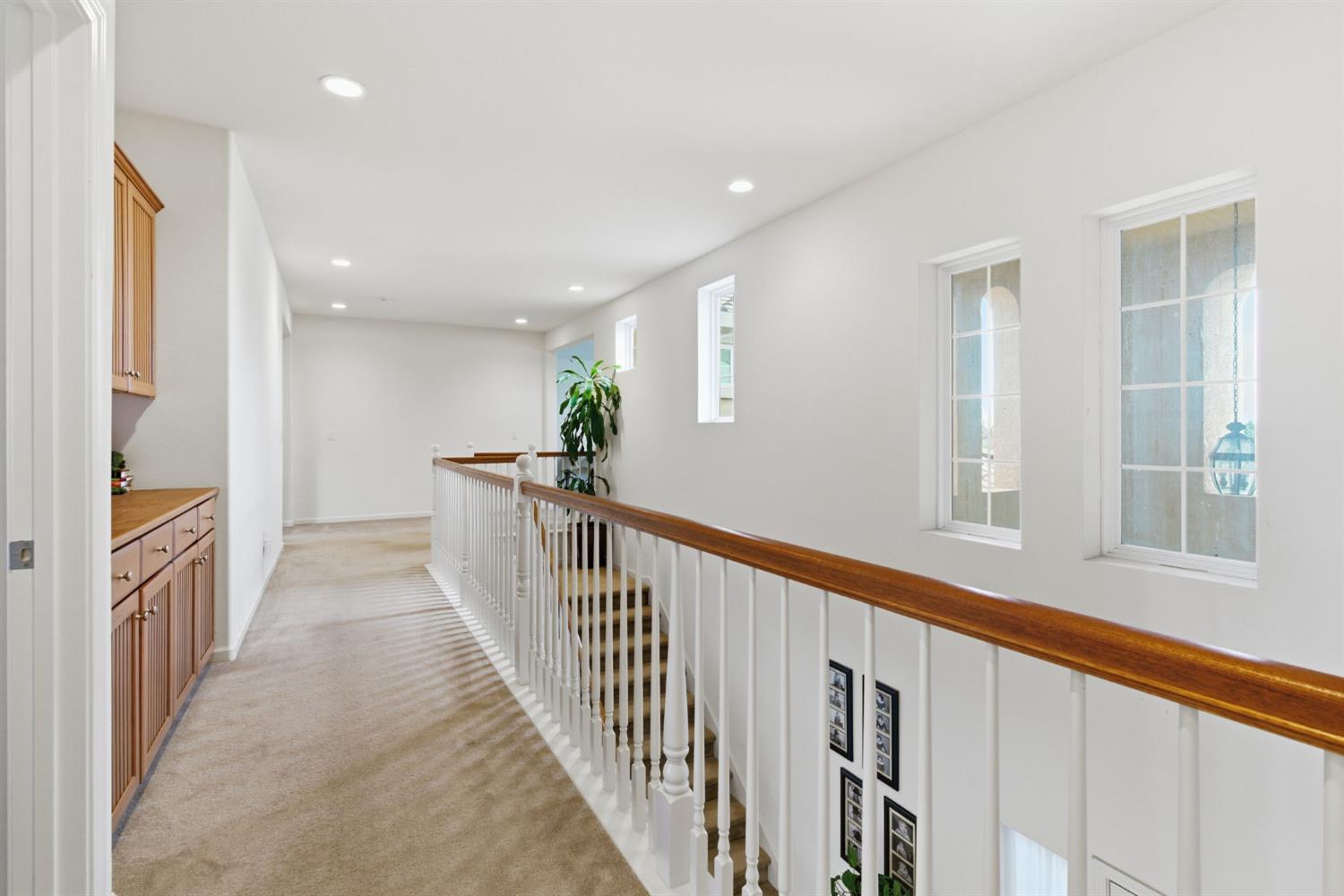 1806 West Ripon Road Ripon, CA 95366 - Photo 32 of 65 a view of a hallway with windows