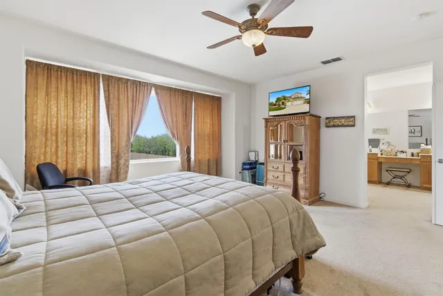 a view of a house with swimming pool