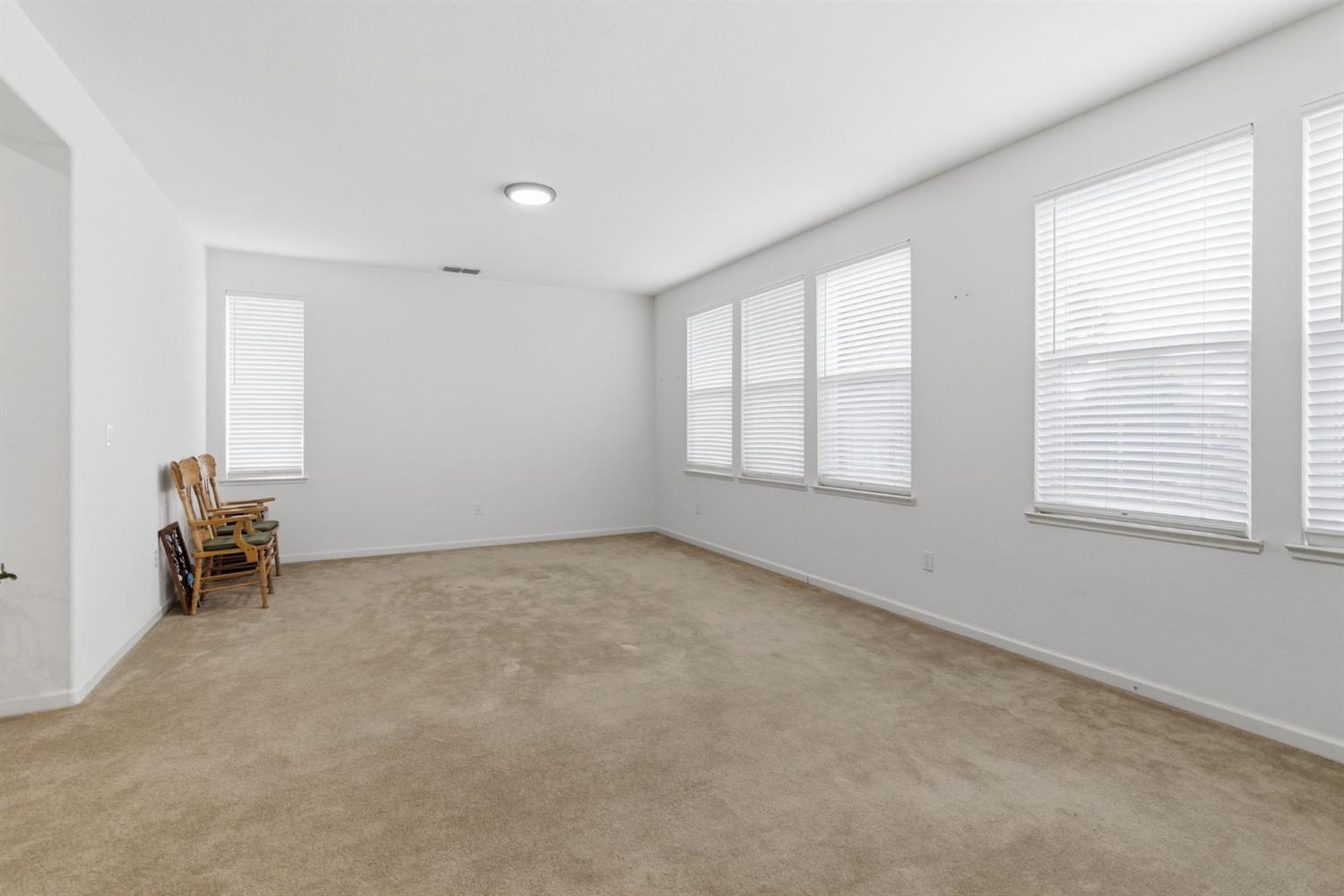 1806 West Ripon Road Ripon, CA 95366 - Photo 10 of 65 an empty room with windows