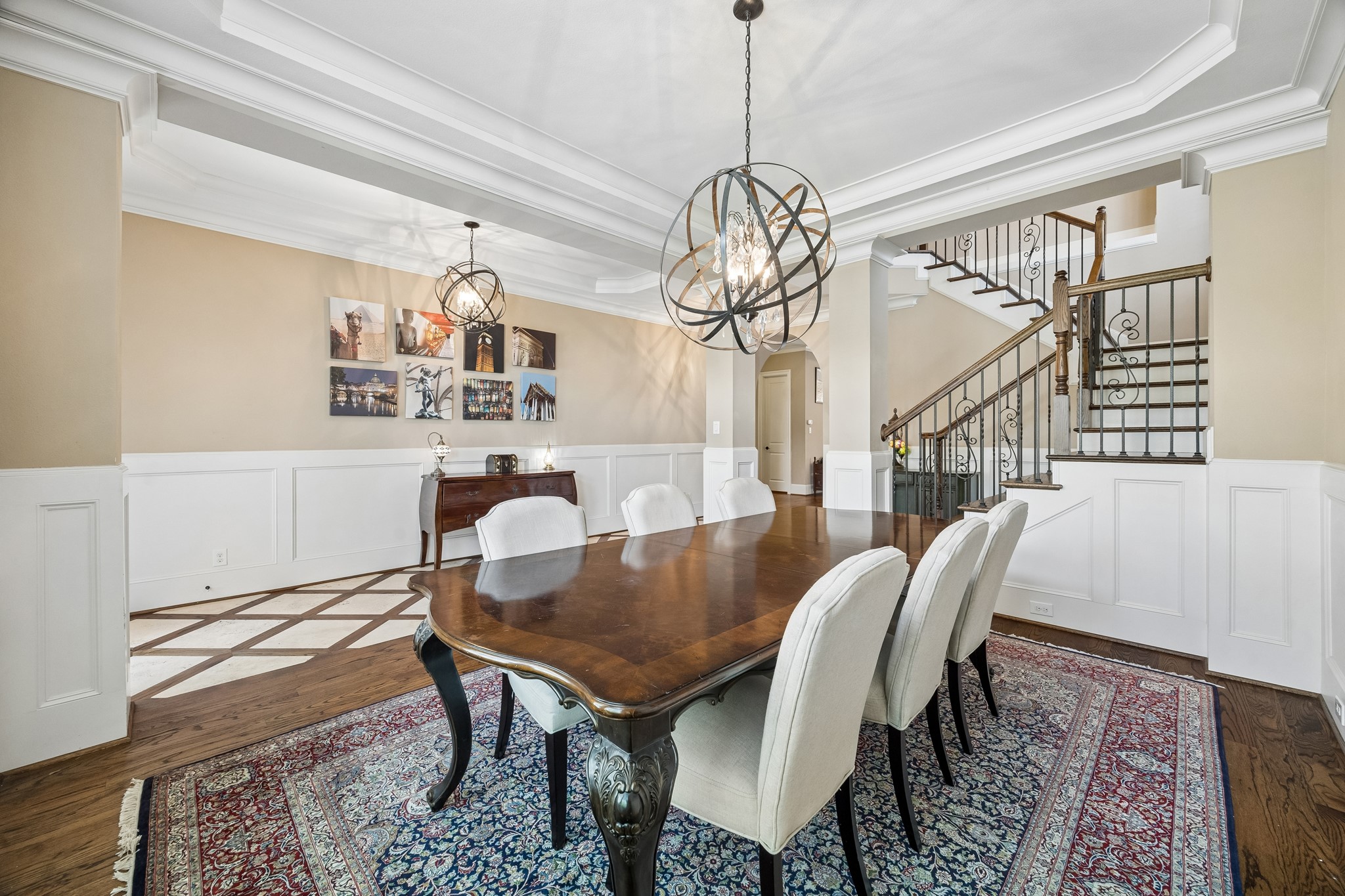 1360 Chippendale Road Houston, TX 77018 - Photo 5 of 34 Another view of the formal dining room highlighting its seamless connection to the foyer and staircase. Thoughtfully designed layout creates excellent flow for entertaining while maintaining a refined and welcoming atmosphere.