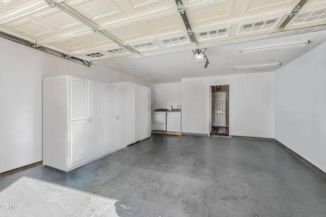 a view of a swimming pool with a lounge chairs