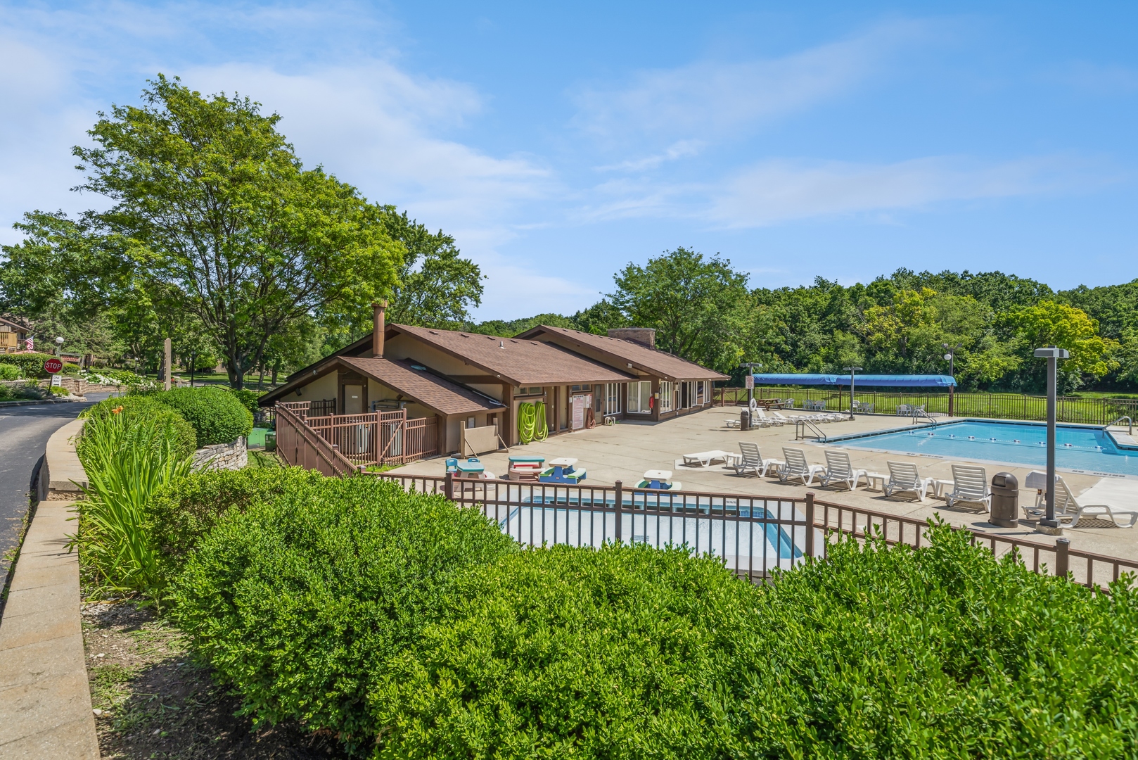 20 St Thomas Colony Street, Unit 7 Fox Lake, IL 60020 - Photo 11 of 15 a view of a house with a big yard and potted plants