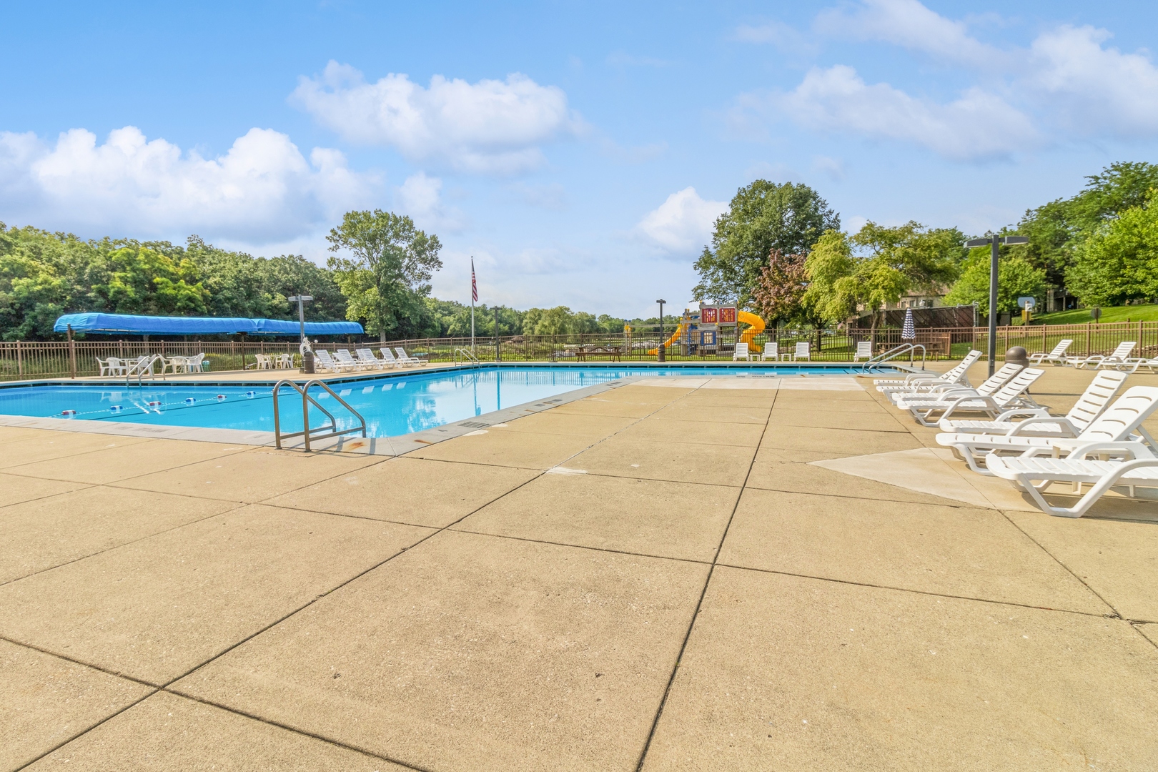 20 St Thomas Colony Street, Unit 7 Fox Lake, IL 60020 - Photo 12 of 15 a view of a swimming pool and an outdoor space