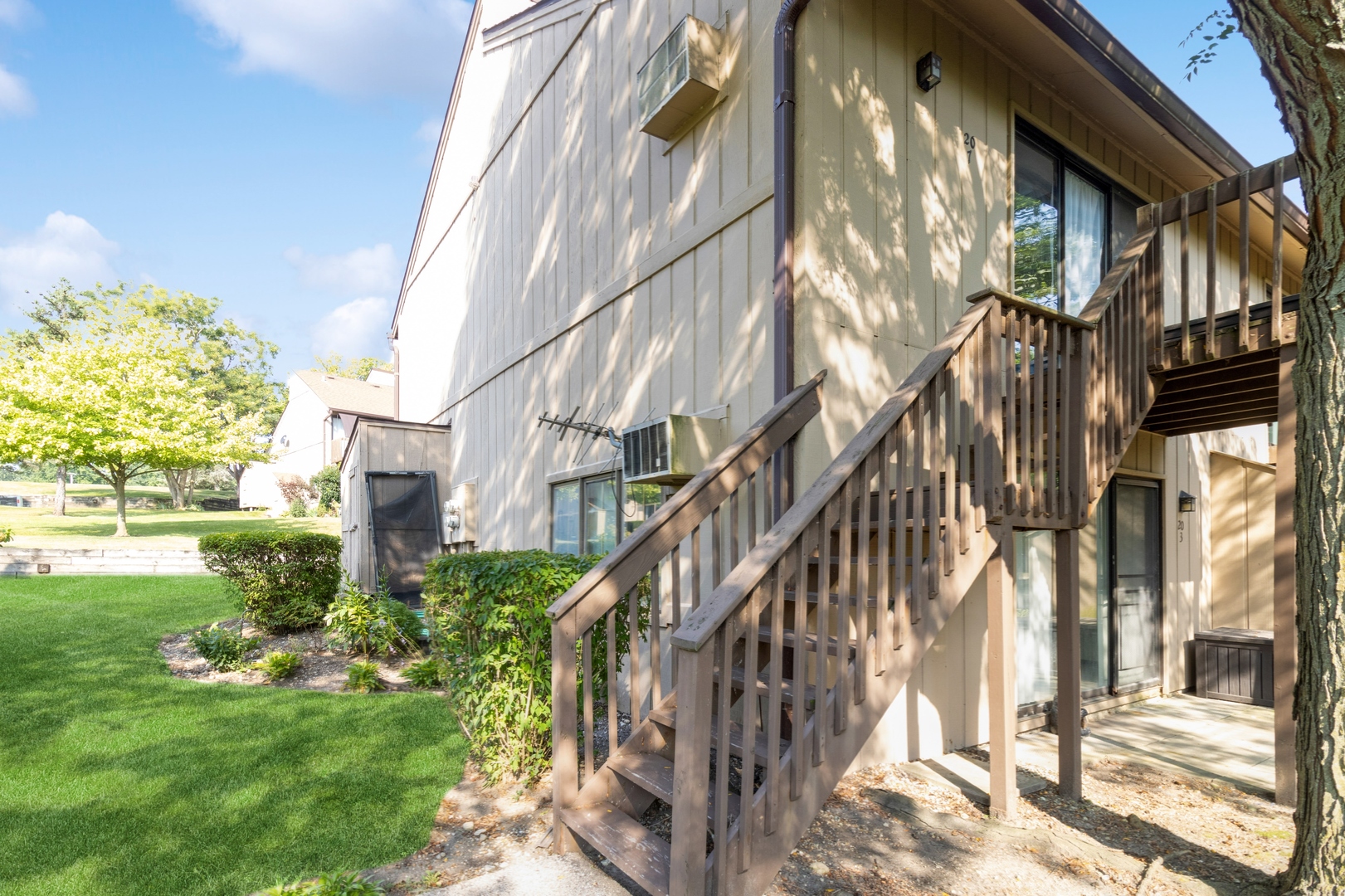 20 St Thomas Colony Street, Unit 7 Fox Lake, IL 60020 - Photo 2 of 15 a view of a pathway of a building