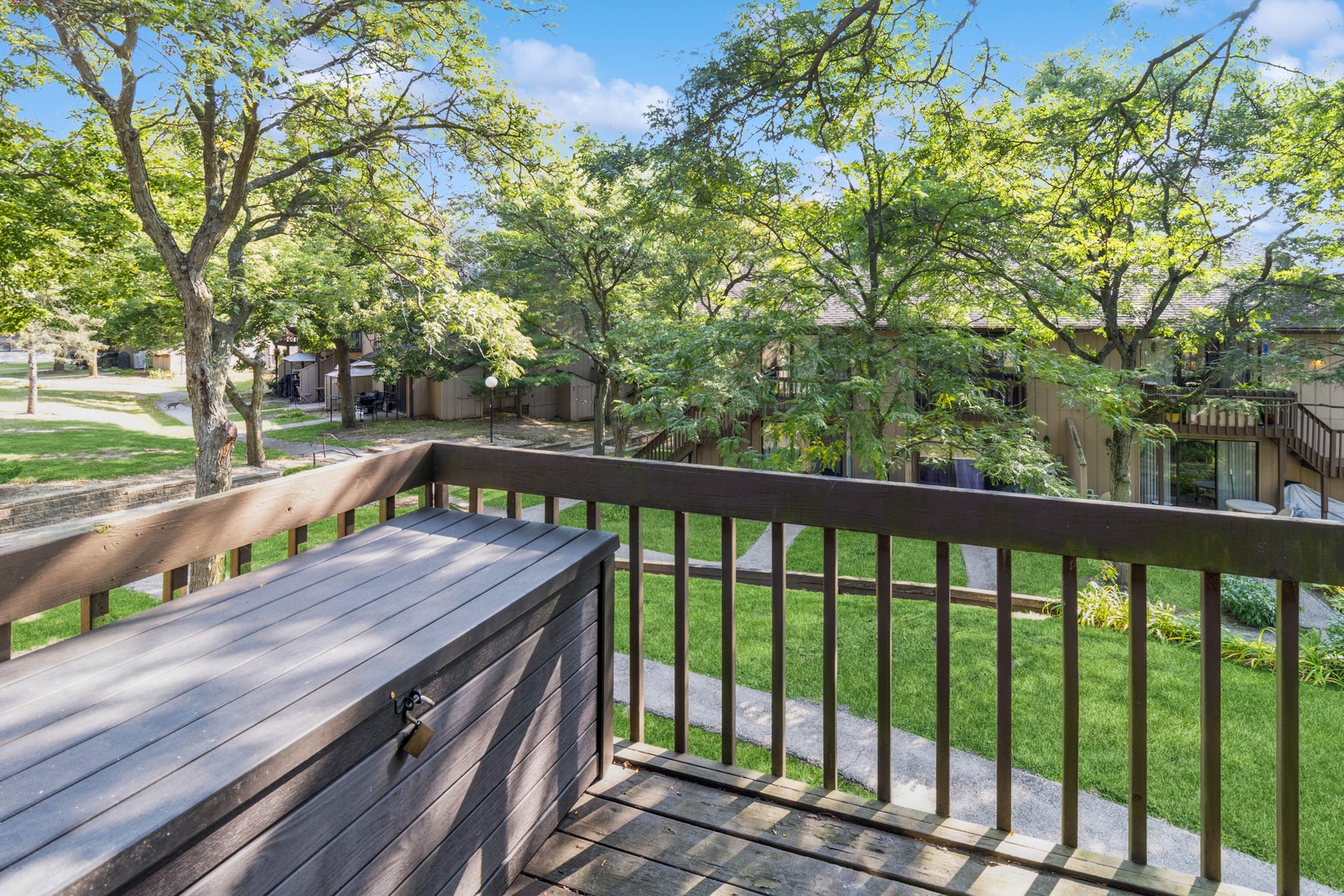 20 St Thomas Colony Street, Unit 7 Fox Lake, IL 60020 - Photo 3 of 15 a view of a wooden deck and a yard