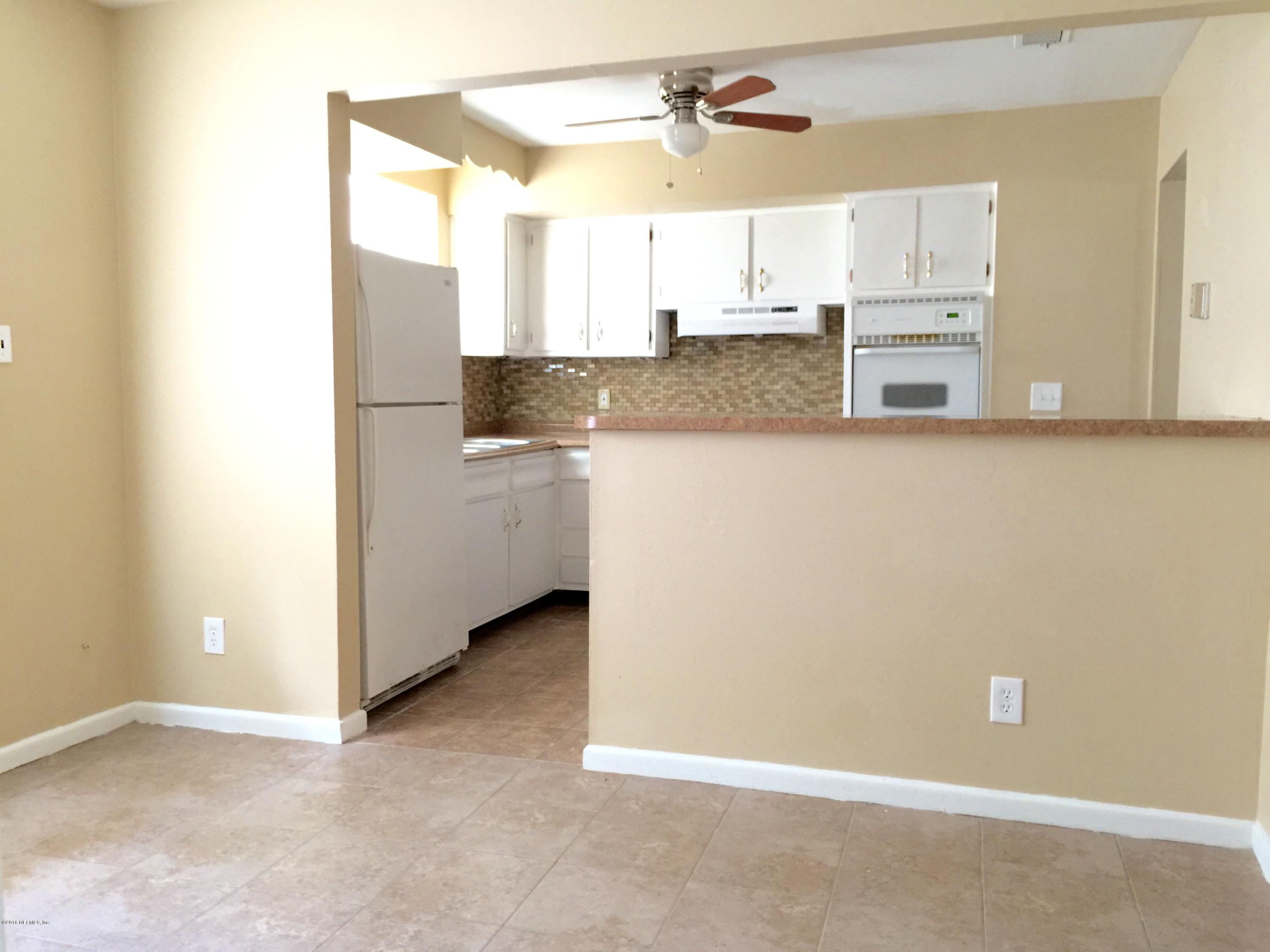6121 Anvil Road Jacksonville, FL 32277 - Photo 9 of 31 a view of a kitchen with a sink
