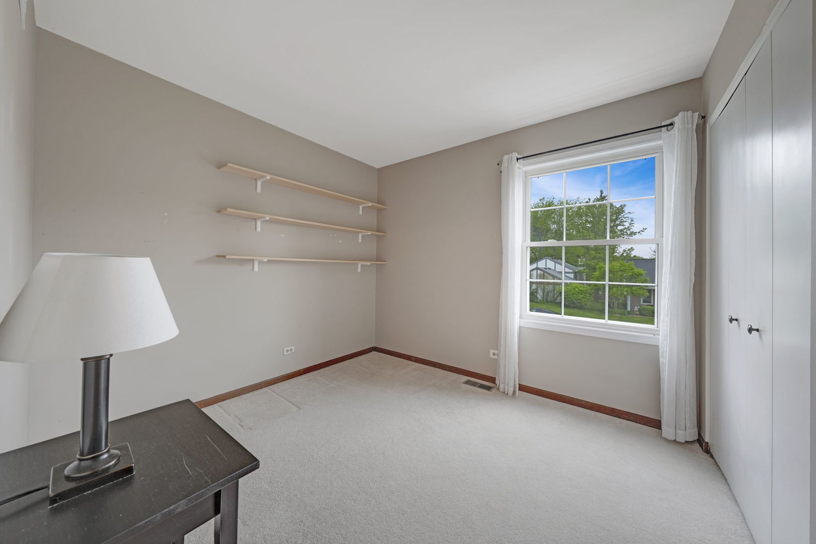 4977 Prairie Oak Road Gurnee, IL 60031 - Photo 21 of 26 a view of an empty room with a window