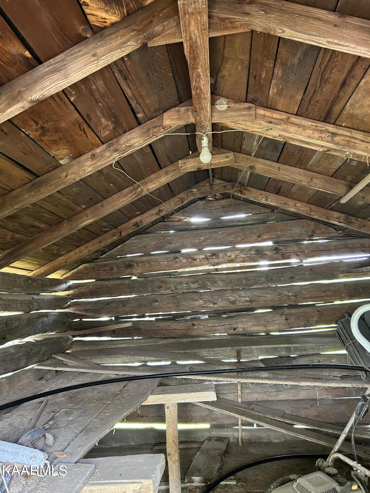 866 Niggs Creek Road Oneida, TN 37841 - Photo 14 of 39 a view of room with wooden floor