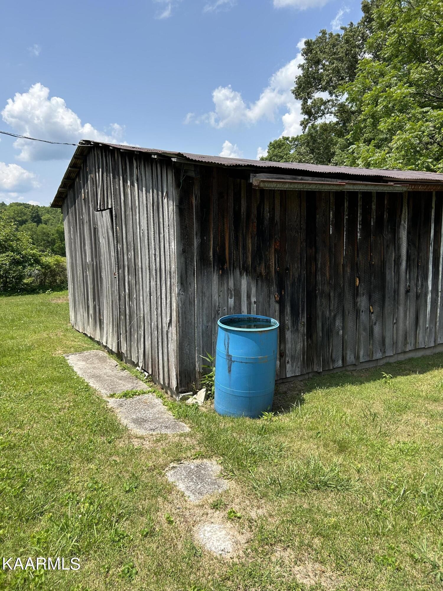 866 Niggs Creek Road Oneida, TN 37841 - Photo 27 of 39 a view of a backyard of the house