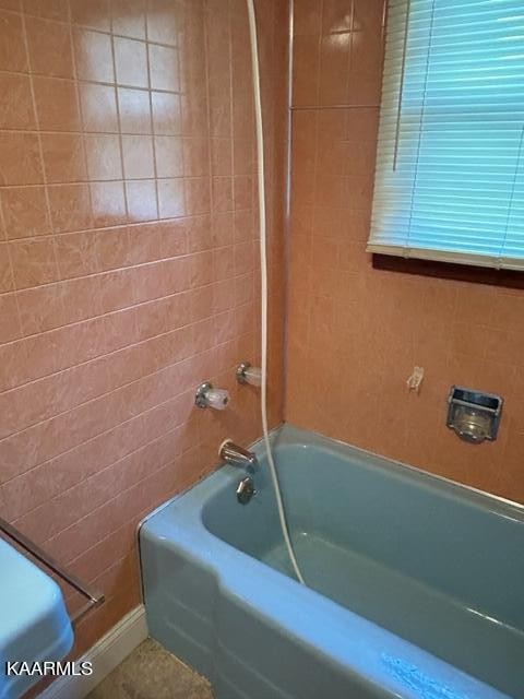 866 Niggs Creek Road Oneida, TN 37841 - Photo 38 of 39 a bathroom with a sink and bathtub