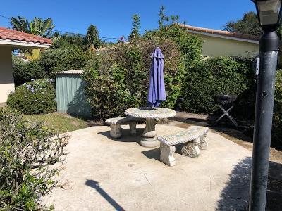 1911 Northeast 27th Court, Unit 13 Lighthouse Point, FL 33064 - Photo 12 of 61 a view of a backyard with sitting area